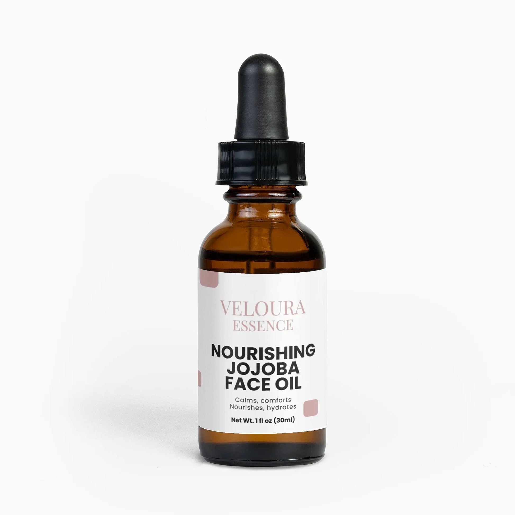 Bottle of Veloura Essence Nourishing Jojoba Face Oil on a white background