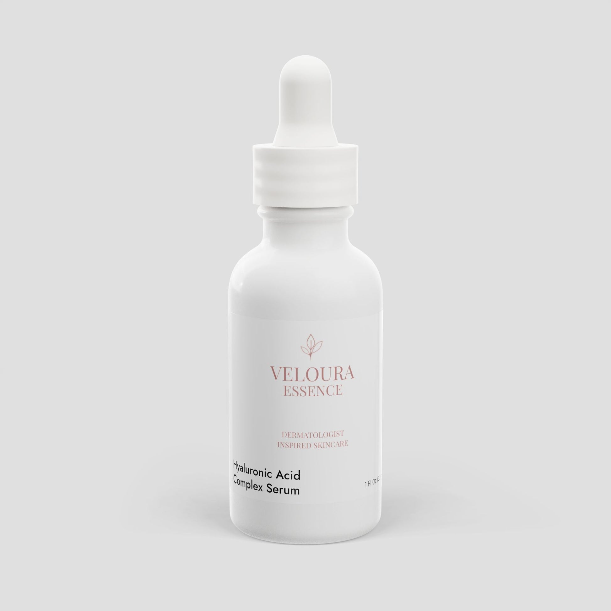 Veloura Essence Hyaluronic Acid Complex Serum bottle on a light gray background