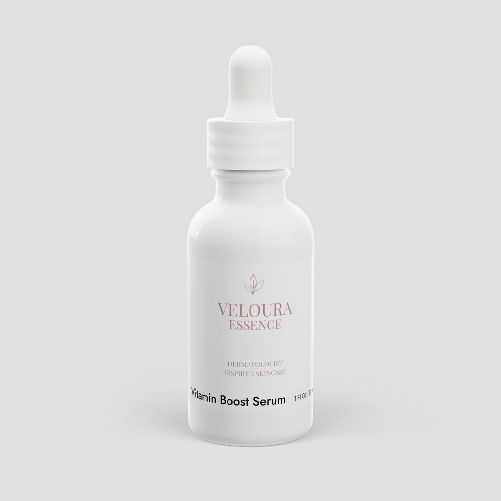 White bottle of Veloura Essence Vitamin Boost Serum on a light gray background