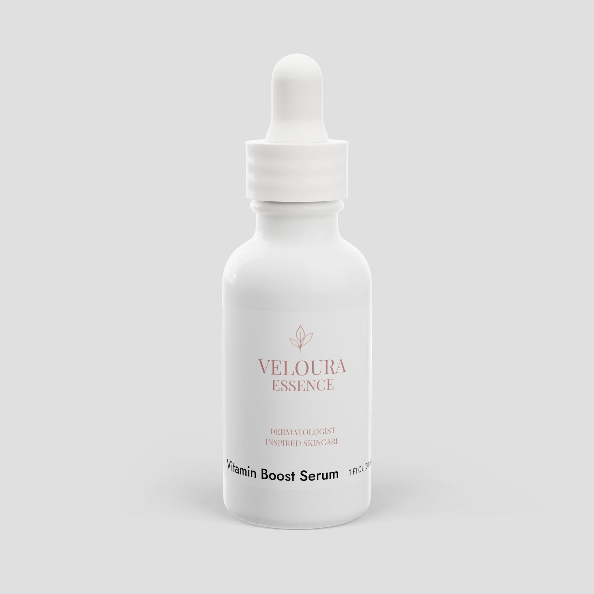 White bottle of Veloura Essence Vitamin Boost Serum on a light gray background